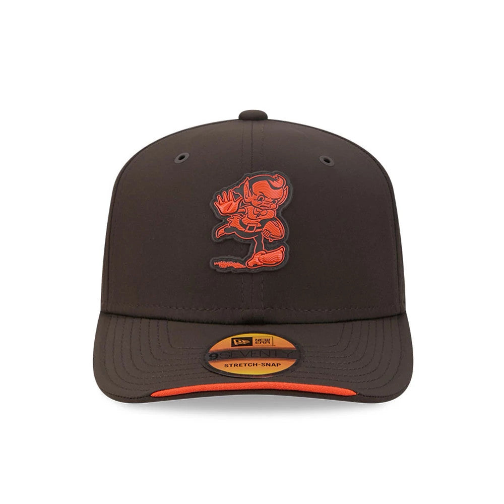 Browns NFL Sideline 2026 Dark Brown New Era 9SEVENTY Stretch Snap Adjustable Cap, front view showing a raised orange embroidered mascot logo on the structured dark brown crown, a flat visor with orange edging.