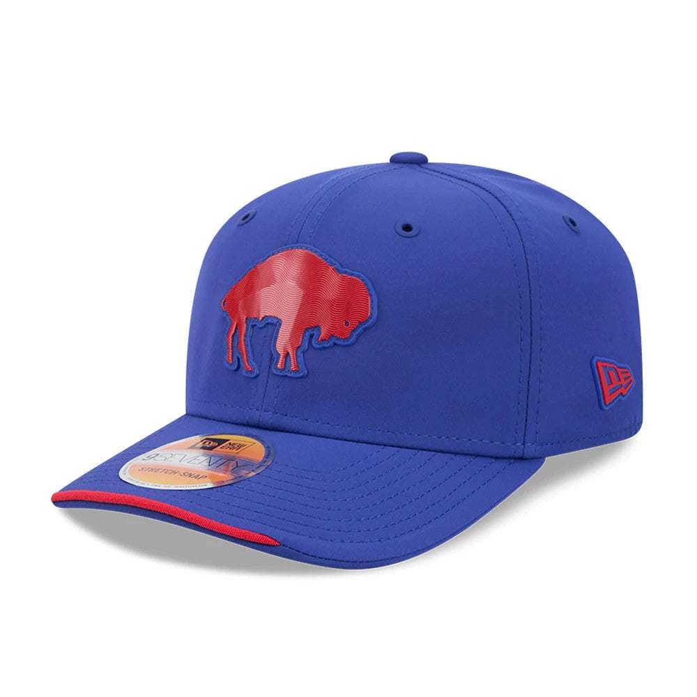 Buffalo Bills NFL Sideline 2026 Blue New Era 9SEVENTY Stretch Snap Adjustable Cap, three-quarter view showing the red raised buffalo logo on the front panel, the red New Era flag embroidered on the left side.