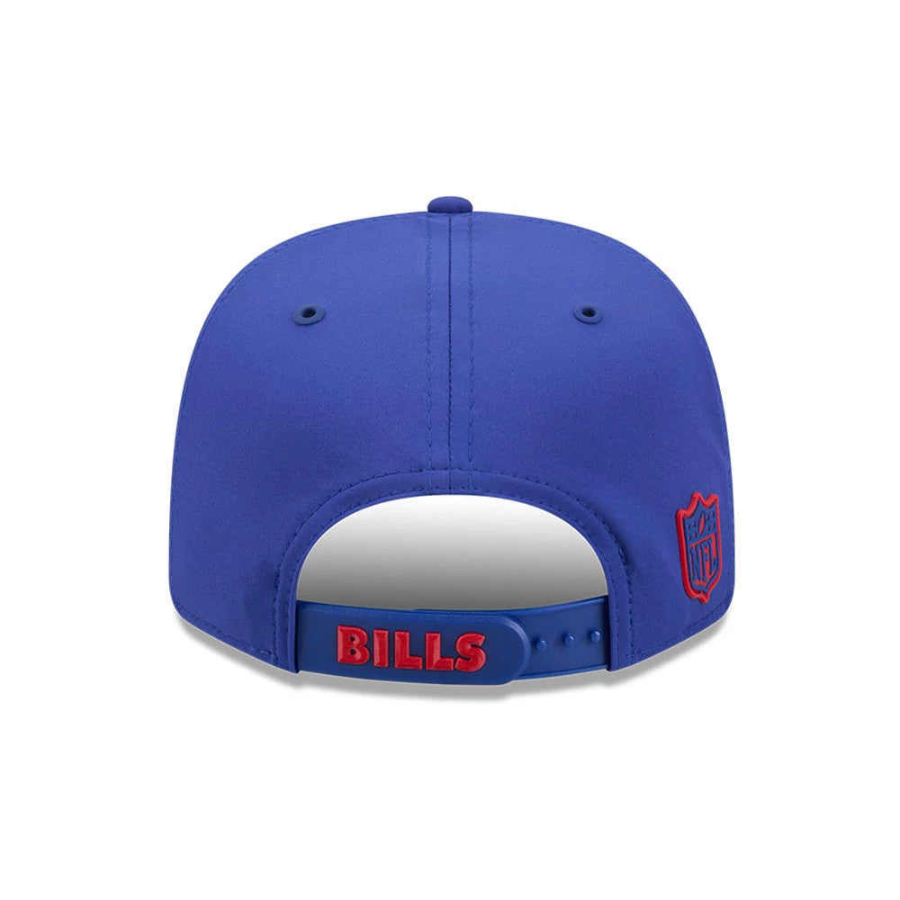 Buffalo Bills NFL Sideline 2026 Blue New Era 9SEVENTY Stretch Snap Adjustable Cap, rear view showing the red embroidered Bills text on the blue adjustable snap at the back, with the NFL shield logo embroidered on the right side panel.