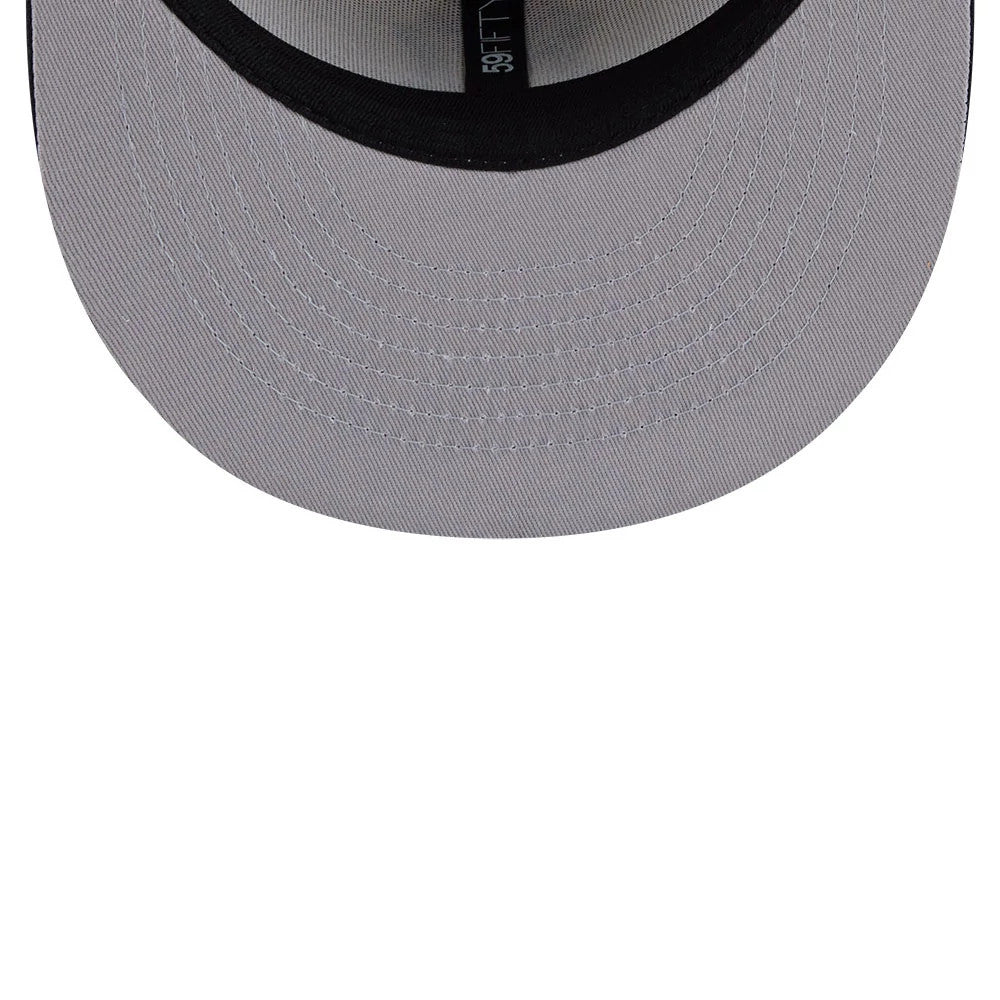 New York Yankees MLB Heritage Light Beige New Era 59FIFTY Fitted Cap, inside view showing a black sweatband, grey undervisor and New Era 59FIFTY branding on the taping, with detailed stitching on the underside of the light beige visor.