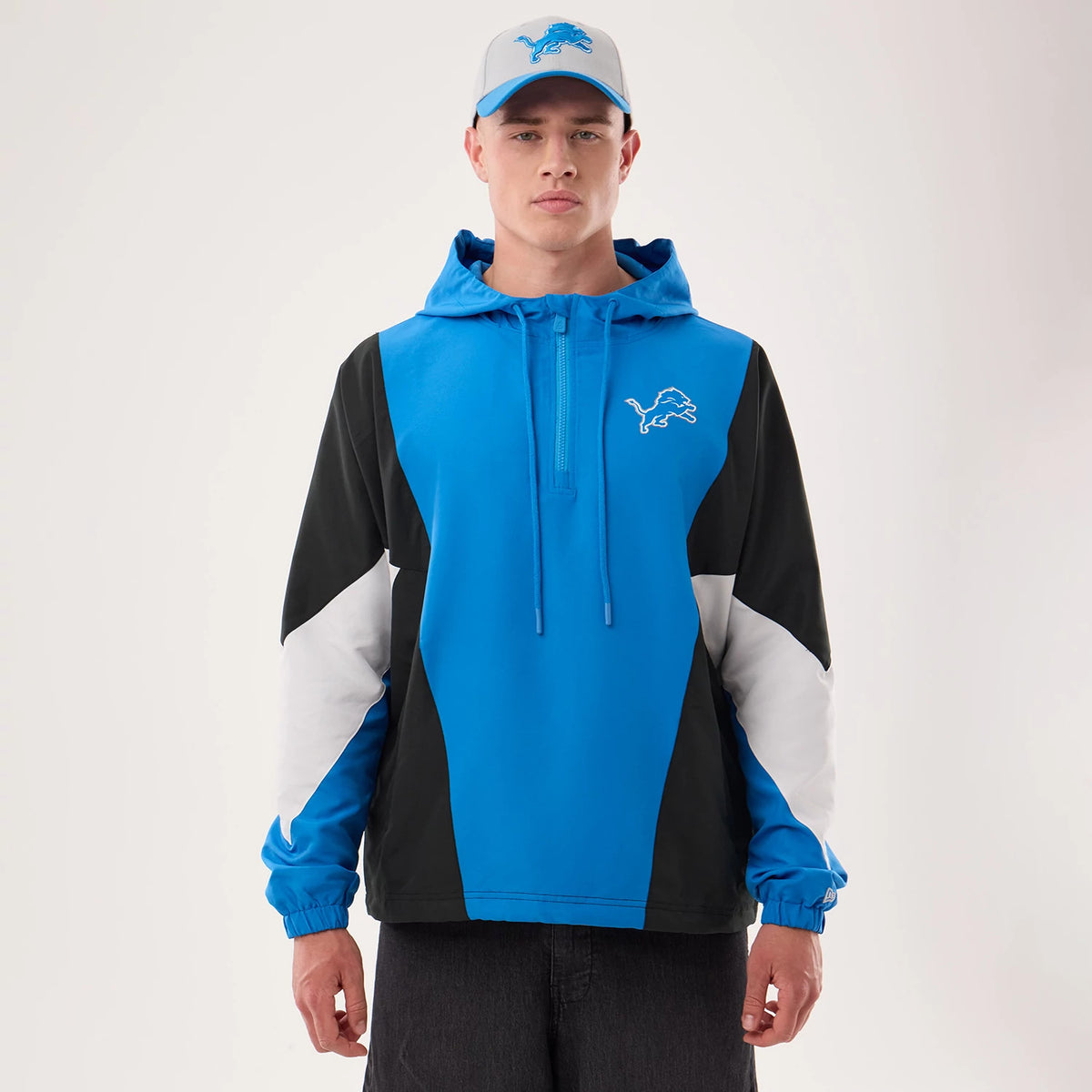 The model is wearing this NFL Detroit Lions Jacket in blue. 1