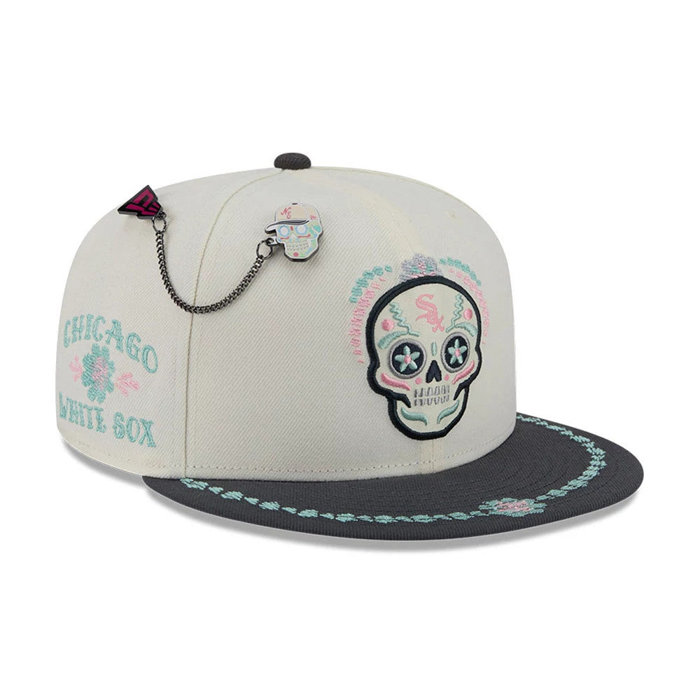 White Sox MLB Day Of The Dead Light Beige & Black New Era 59FIFTY Fitted Cap, three-quarter view showing a colourful embroidered skull graphic on the front panel, intricate floral embroidery on the black visor.