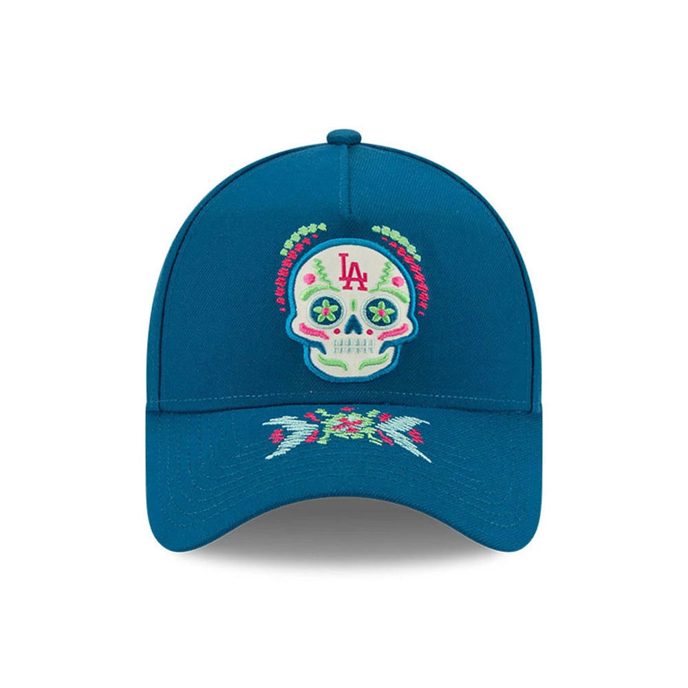 LA Dodgers MLB Day Of The Dead Blue New Era 9FORTY A-Frame Adjustable Cap, front view showing a colourful embroidered sugar skull with floral patterns on the front panel, and matching embroidery designs on the blue curved visor.