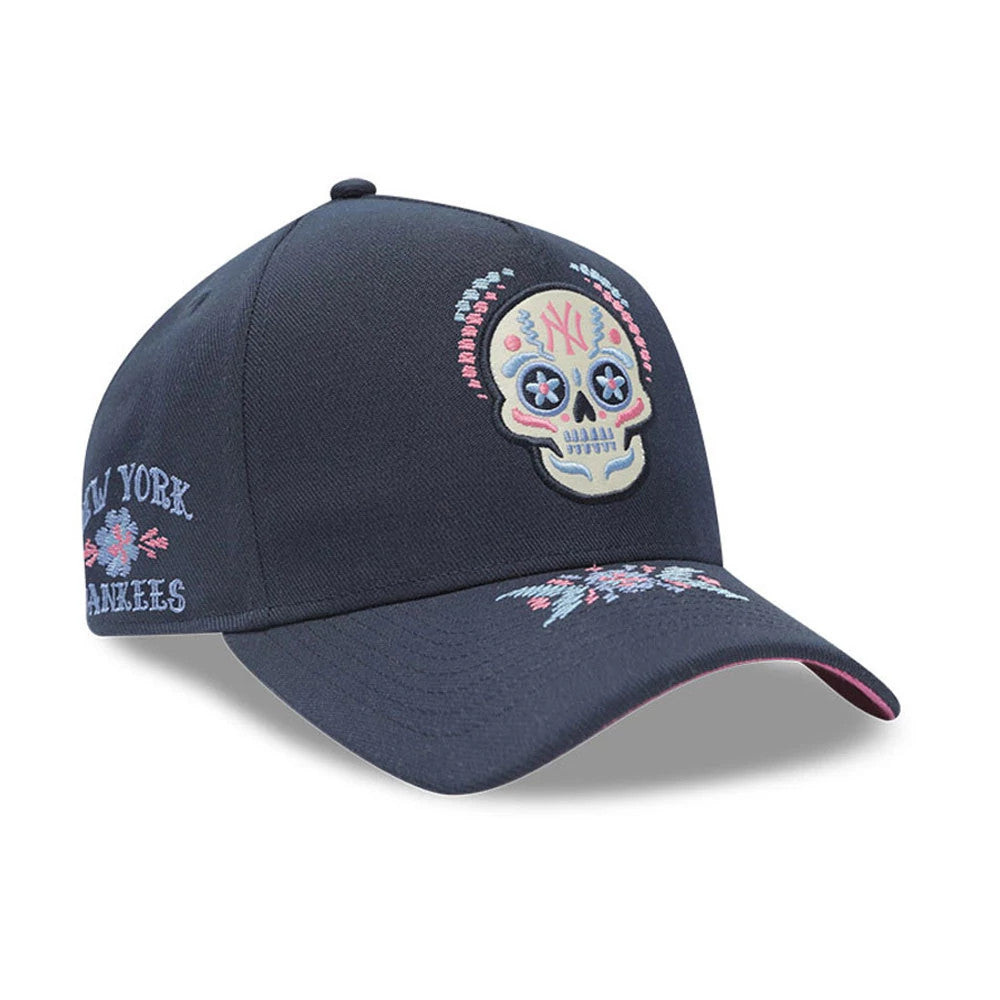 Yankees MLB Day Of The Dead Dark Blue New Era 9FORTY A-Frame Adjustable Cap, three-quarter view showing a large embroidered sugar skull design on the dark blue front panel, floral embroidery on the visor.