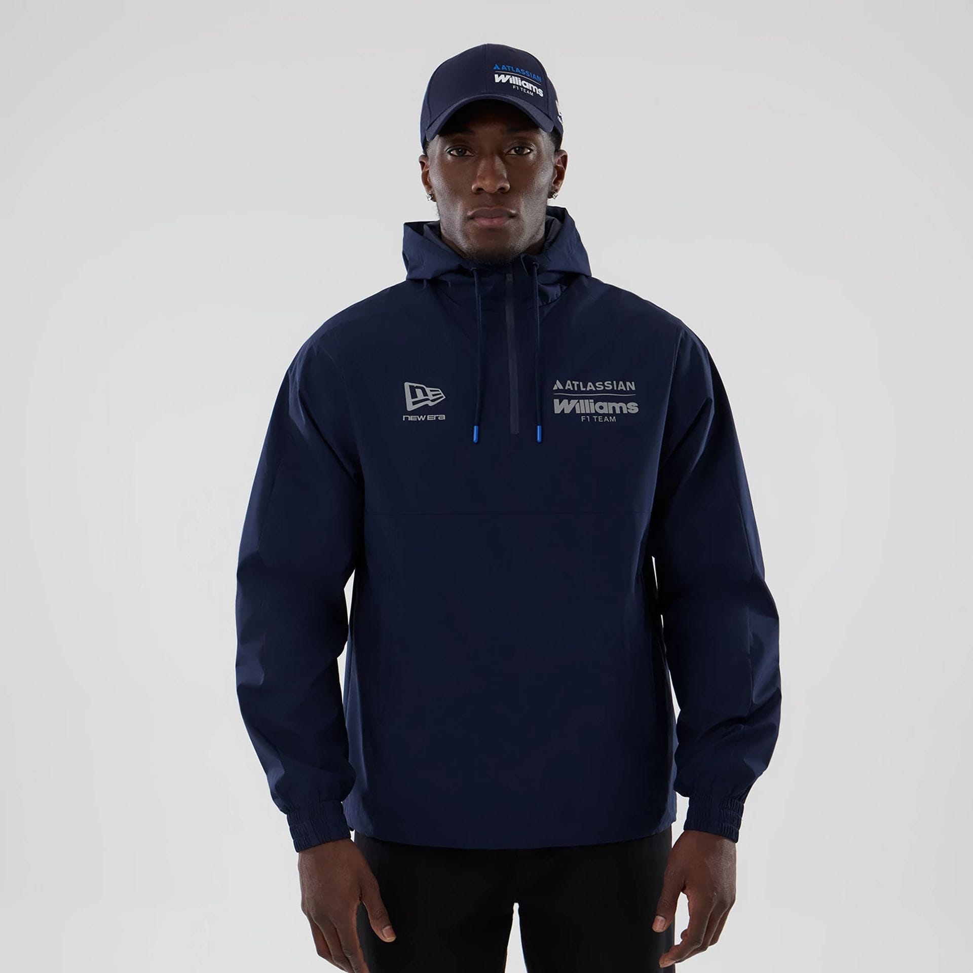 The model is wearing this Atlassian Williams F1 Team Windbreaker Jacket in navy. 1