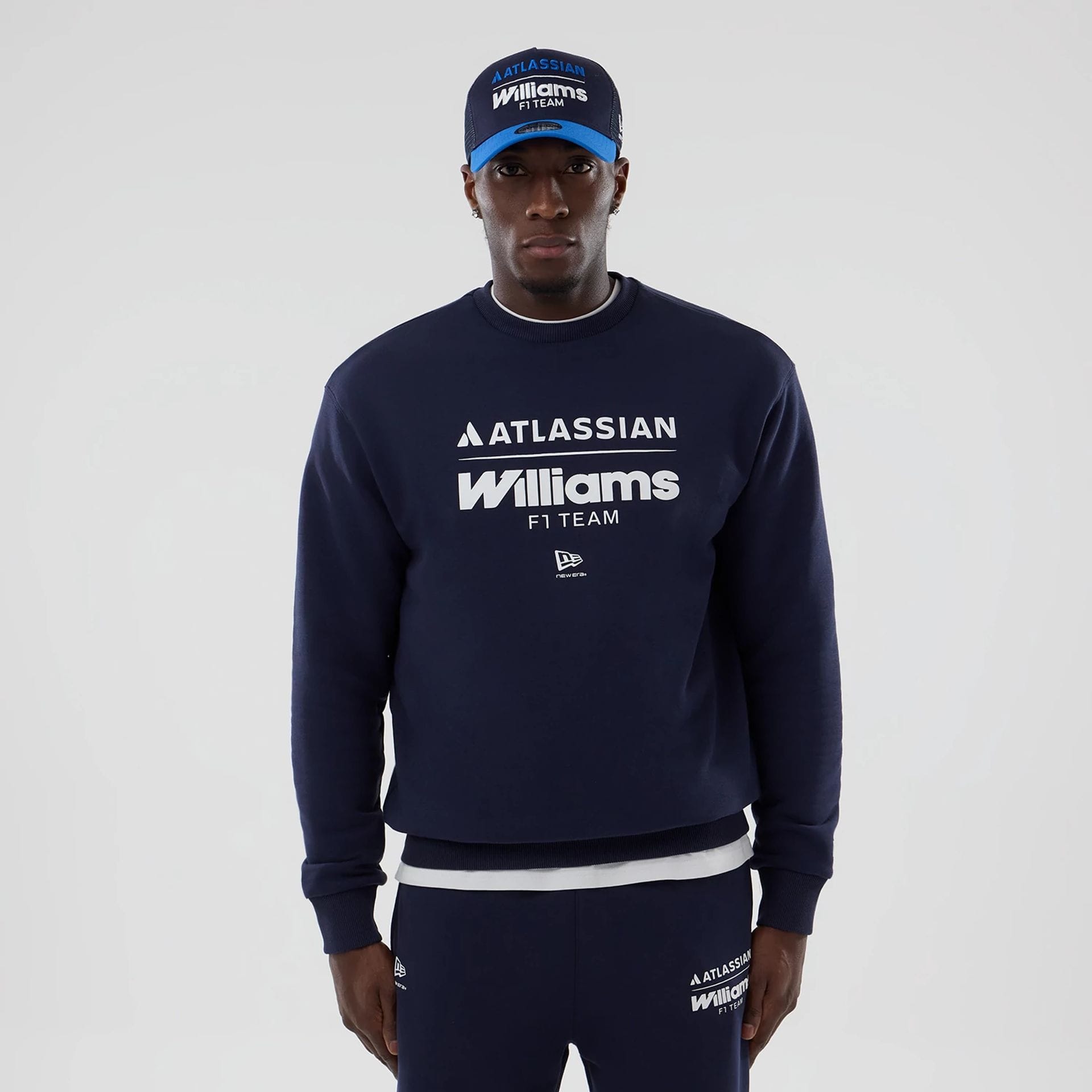 The model is wearing this Atlassian Williams F1 Team Oversized Crew Neck Sweater in navy. 1