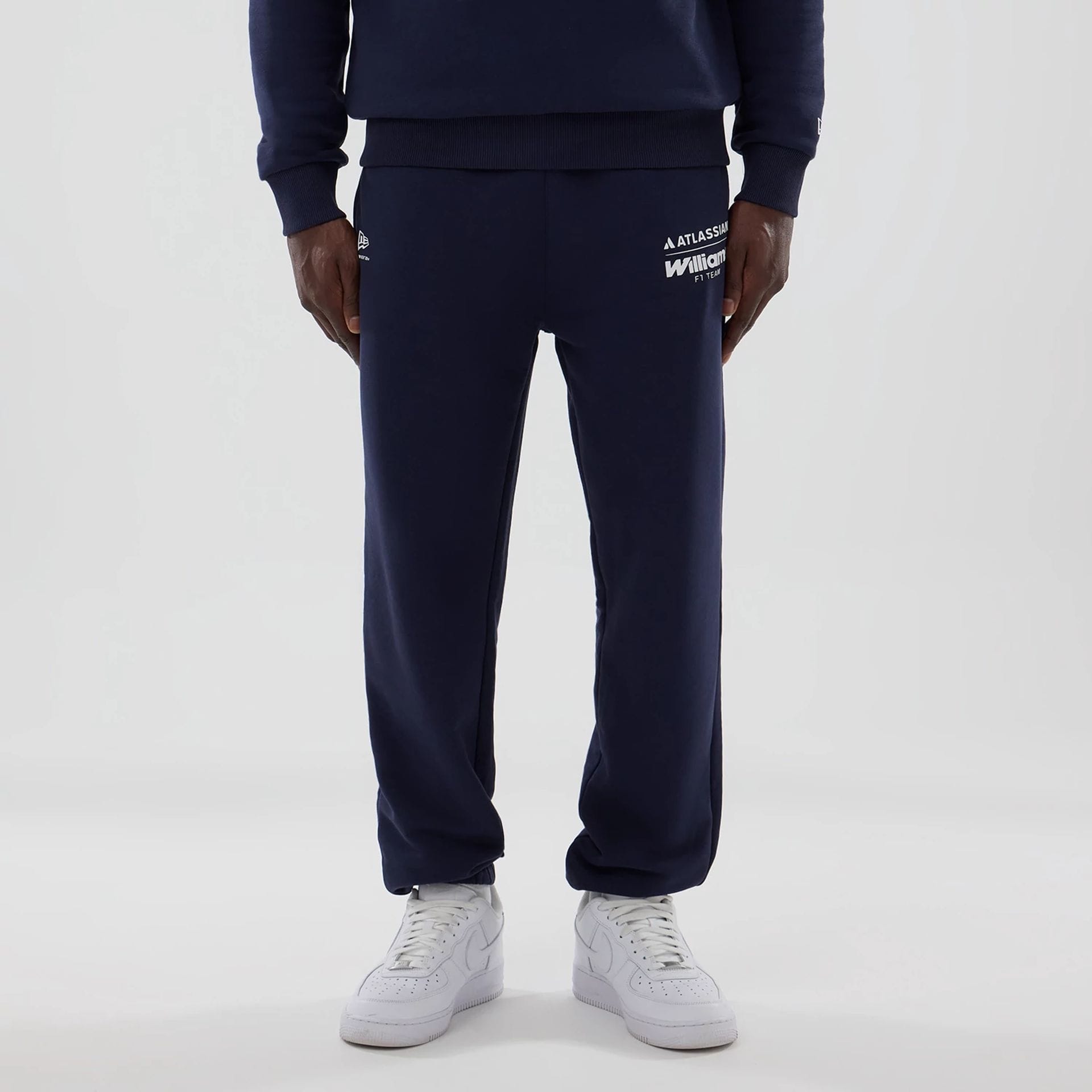The model is wearing these Atlassian Williams F1 Team Joggers in navy. 1
