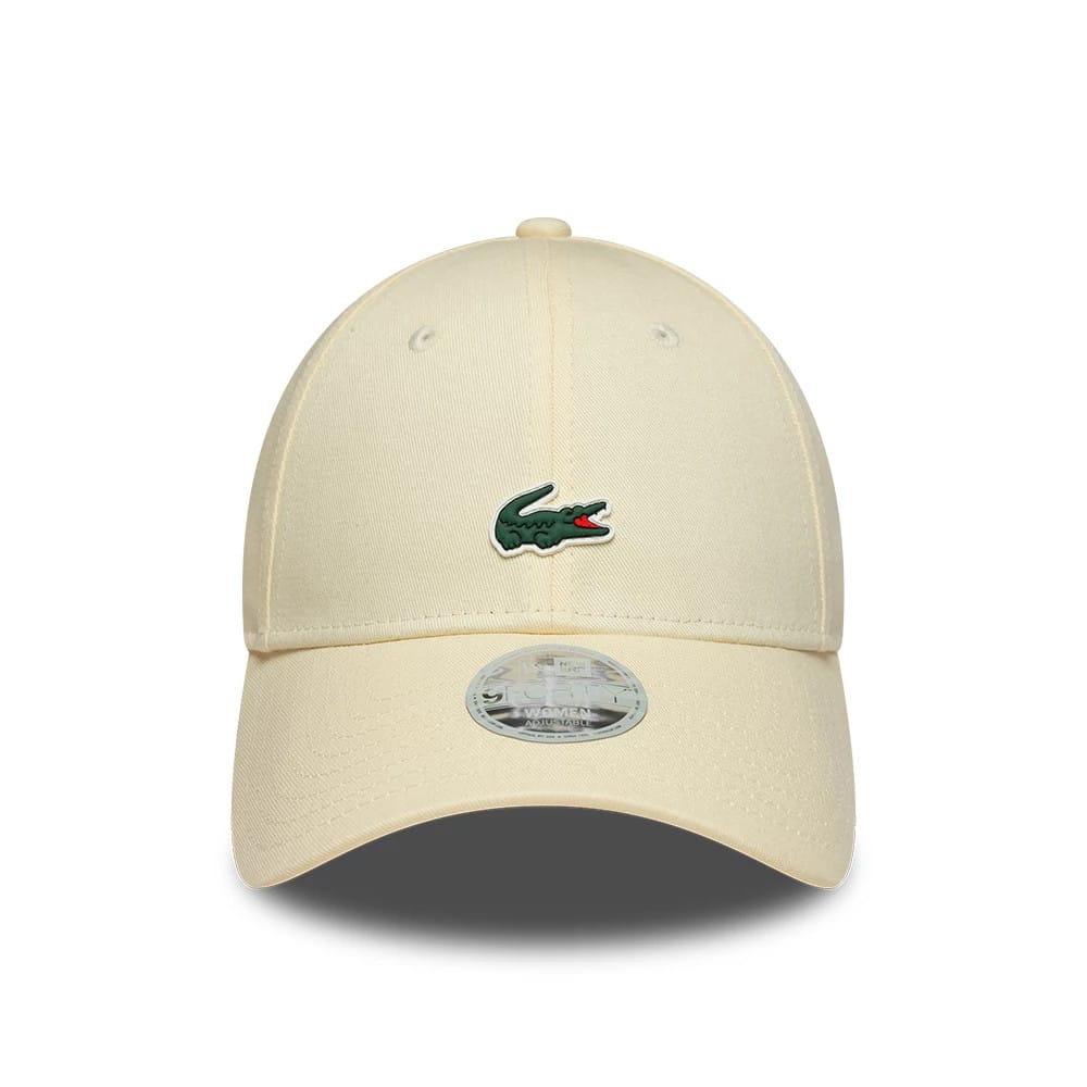 Pictured is this Womens Lacoste X New Era 9FORTY cap in light beige. 2