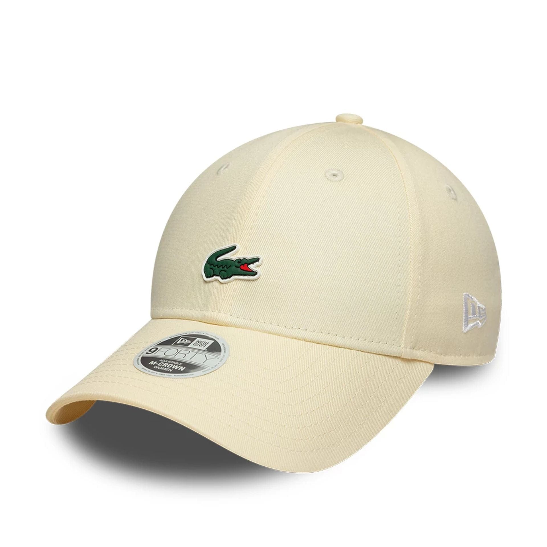 Pictured is this Womens Lacoste X New Era 9FORTY cap in light beige. 1