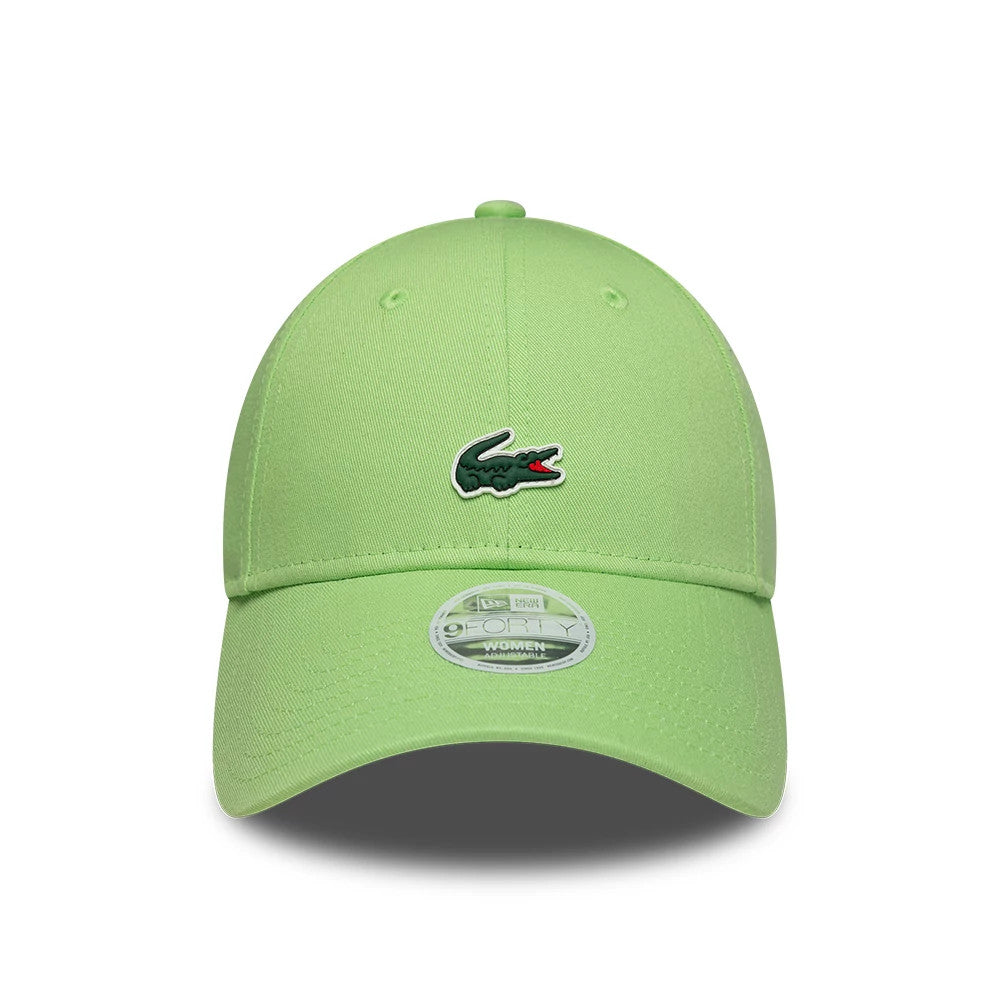 Womens Lacoste X New Era Pastel Green 9FORTY Adjustable Cap, front view showing the Lacoste crocodile logo embroidered on the structured pastel green crown, with a curved visor and 9FORTY size sticker centrally placed on the visor.