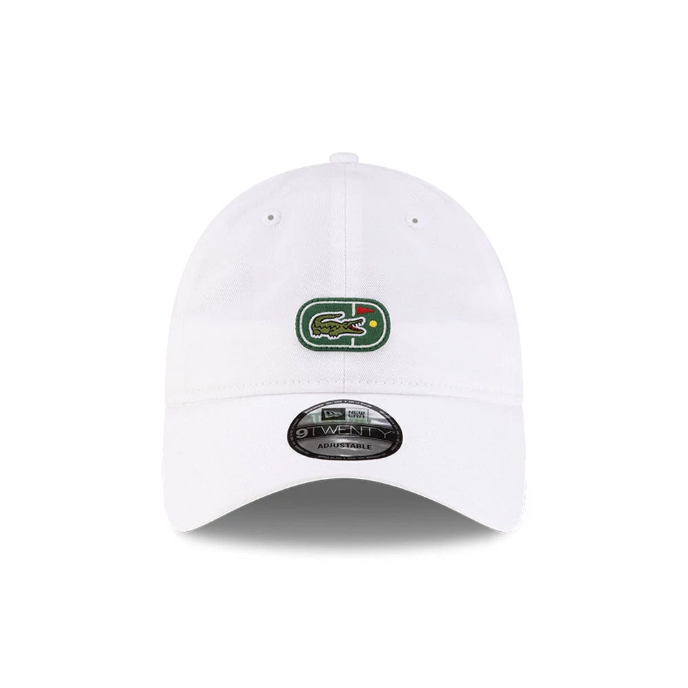 Lacoste X New Era Golf Flag White New Era 9TWENTY Adjustable Cap, front view showing the embroidered green and red Lacoste logo on the white crown, with a curved white visor and a 9TWENTY size sticker on the visor.