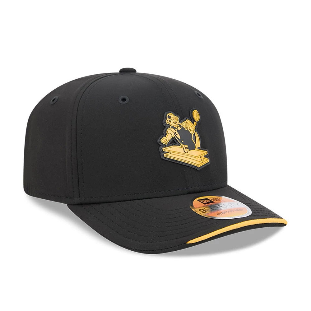 Steelers NFL Sideline 2026 Black New Era 9SEVENTY Stretch Snap Adjustable Cap, three-quarter view showing an embossed yellow emblem on the front panel, a black curved visor with a yellow edge, and a 9SEVENTY size sticker.