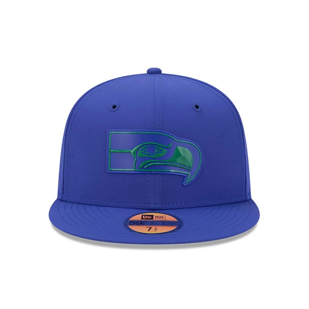 Seattle Seahawks NFL Sideline 2026 Blue New Era 59FIFTY Fitted Cap, front view showing the raised embroidered green Seahawks logo on the structured blue crown, with a matching blue visor and the gold 59FIFTY size sticker on the visor.