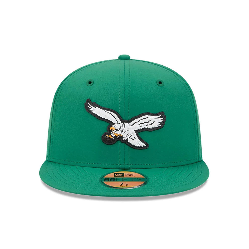 Philadelphia Eagles NFL Sideline 2026 Green New Era 59FIFTY Fitted Cap, front view showing the embroidered white eagle logo on the centre of the structured green crown, with a curved green visor and a gold 59FIFTY size sticker on the visor.