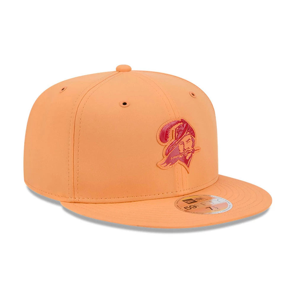 Tampa Bay Buccaneers NFL Sideline 2026 Orange New Era 59FIFTY Fitted Cap, three-quarter view showing the raised red embroidered Buccaneers logo on the front panel, flat orange visor with a gold 59FIFTY size sticker, and matching top button.