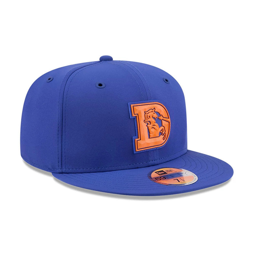 Denver Broncos NFL Sideline 2026 Blue New Era 59FIFTY Fitted Cap, three-quarter view showing the raised orange embroidered retro D logo with a bronco head on the front panel, complemented by a matching blue flat visor and gold 59FIFTY size sticker.