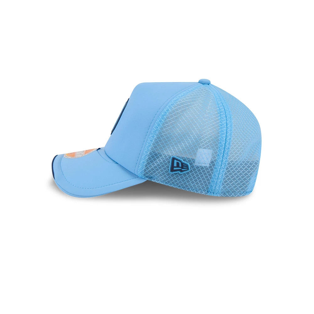 Tennessee Titans NFL Sideline 2026 Pastel Blue New Era 9FORTY Apex Adjustable Cap, side view showing the blue mesh back panels, a raised embroidered New Era flag logo on the left side, and a structured pastel blue front panel with a curved visor.