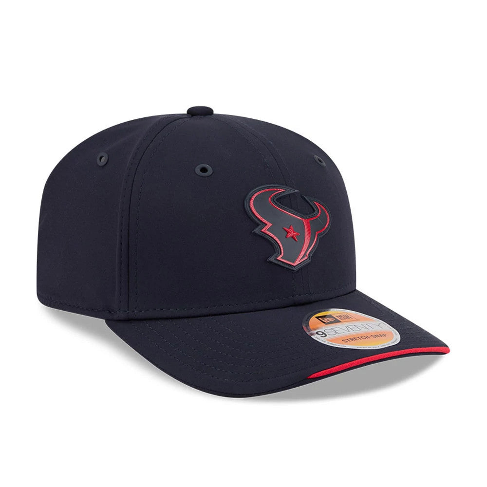 Texans NFL Sideline 2026 Navy New Era 9SEVENTY Stretch Snap Adjustable Cap, three-quarter view showing the raised embroidered red and grey Texans logo on the front panel, a navy curved visor with a red edge, and a 9SEVENTY size sticker.