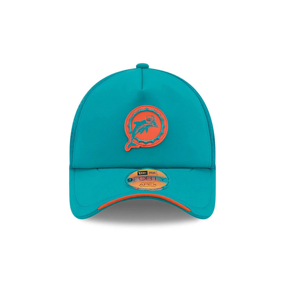 Miami Dolphins NFL Sideline 2026 Turquoise New Era 9FORTY Apex Adjustable Cap, front view showing the raised orange and turquoise embroidered team logo on the front panel, curved turquoise visor with contrasting orange edge, and 9FORTY size sticker.