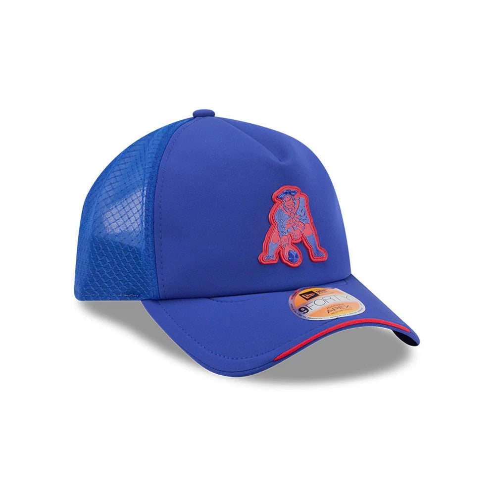 New England Patriots NFL Sideline 2026 Blue New Era 9FORTY Apex Adjustable Cap, three-quarter view showing the red and blue embroidered Patriots logo on the front panel, blue mesh side panels, curved blue visor, and 9FORTY size sticker.