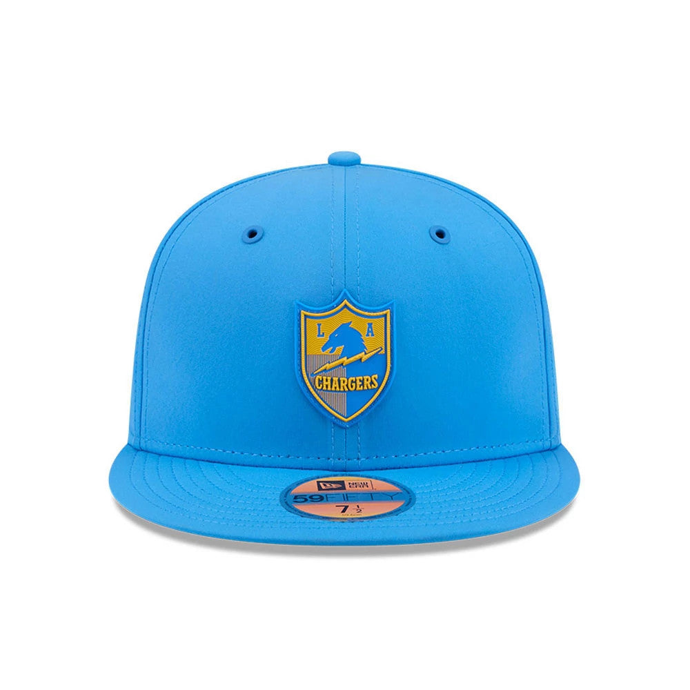 LA Chargers NFL Sideline 2026 Blue New Era 59FIFTY Fitted Cap, front view showing the yellow and blue shield logo with raised embroidery on the front panel, blue eyelets and a blue visor, with a gold 59FIFTY size sticker on the visor.