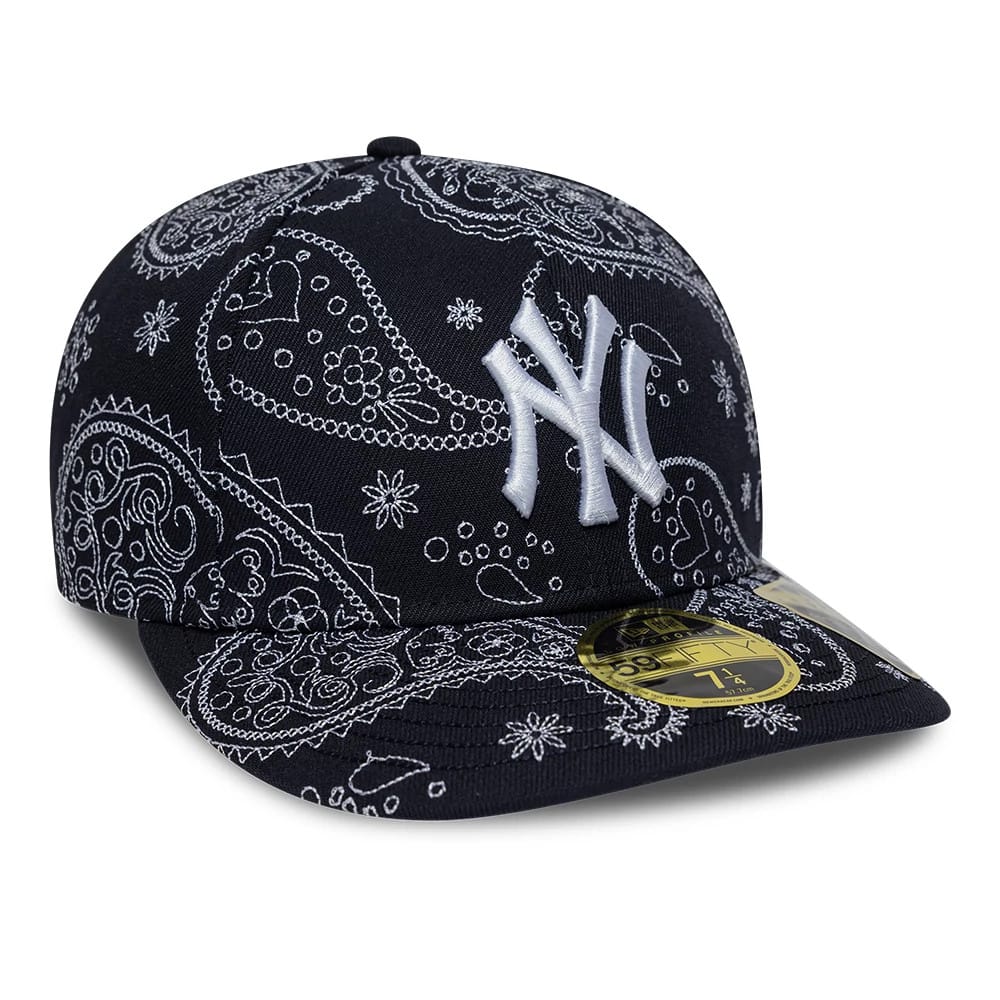 New York Yankees MLB All Over Paisley Navy Low Profile New Era 59FIFTY Fitted Cap, front view showing the white raised embroidered NY logo on the navy structured crown with all-over white paisley print.