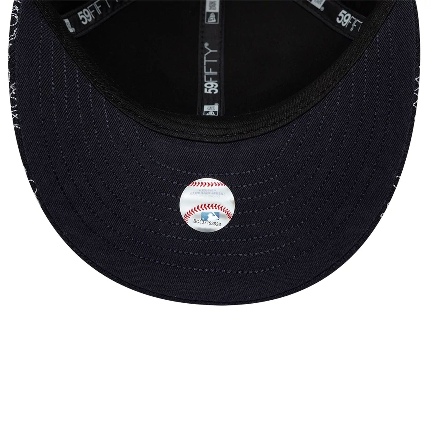 Pictured is this MLB All Over Paisley New York Yankees Low Profile 59FIFTY Fitted cap in navy. 7