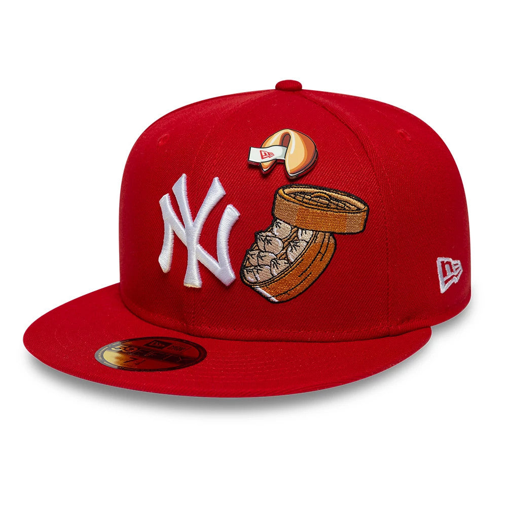 New York Yankees MLB Food Red New Era 59FIFTY Fitted Cap, three-quarter view showing a raised white NY logo, embroidered food graphics including a dumpling basket and fortune cookie, and a 59FIFTY size sticker on the flat red visor.