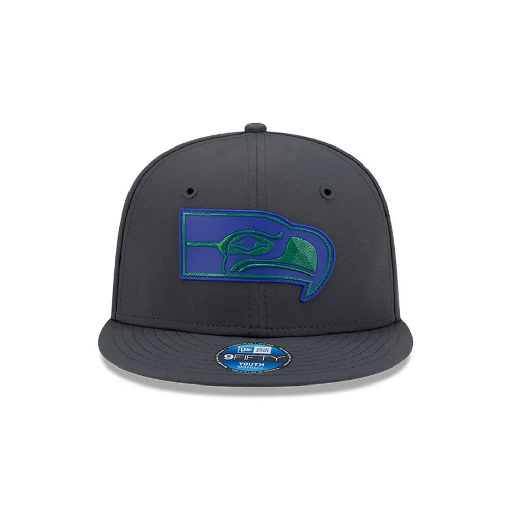 Seahawks Youth NFL Sideline 2026 Charcoal New Era 9FIFTY Snapback Adjustable Cap, front view showing the raised blue and green embroidered Seahawks logo on the front panel, with a charcoal flat visor and a 9FIFTY size sticker on the visor.