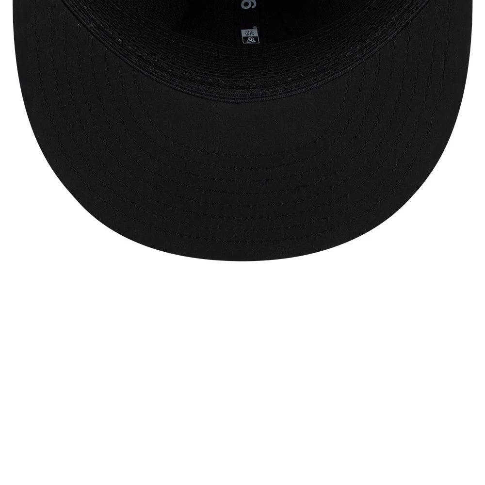 Raiders NFL Sideline 2026 Charcoal New Era 9FIFTY Snapback Adjustable Cap, inside view showing a black sweatband with white New Era branding, charcoal taping lines on the structured crown, and a black undervisor.