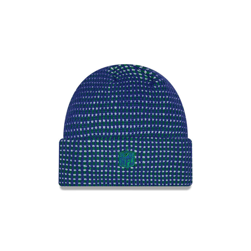 New Era Seattle Seahawks NFL Sideline 2026 Blue Cuff Knit Beanie Hat, front view showing the dark blue and green woven pattern with an embroidered blue NFL shield logo on the front of the upturned cuff.
