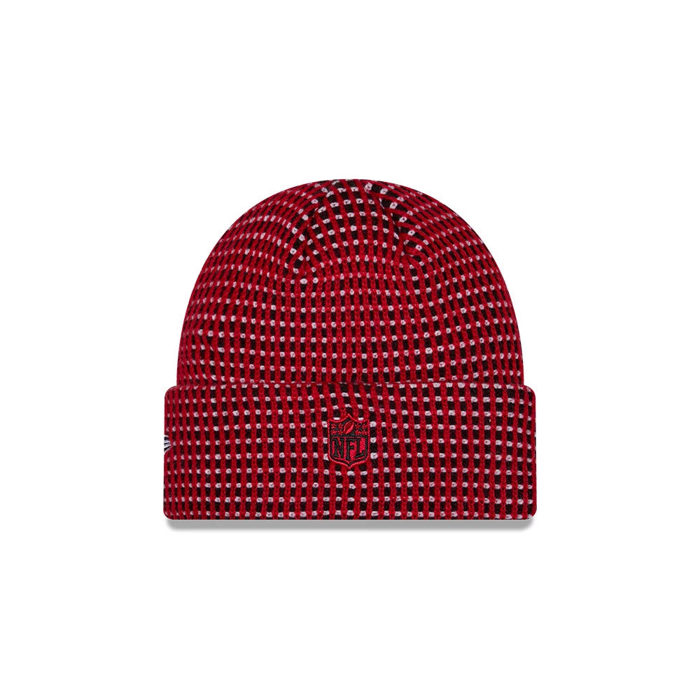 New Era San Francisco 49ers NFL Sideline 2026 Red Cuff Knit Beanie Hat, front view showing a red and white checkered knit pattern throughout, an embroidered NFL shield logo on the front cuff, and a discreet New Era flag logo on the side.