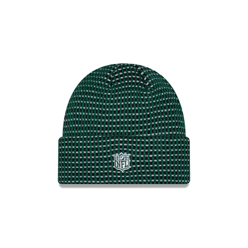 New Era New York Jets NFL Sideline 2026 Dark Green Cuff Knit Beanie Hat, front view showing the white embroidered NFL shield logo centred on the cuff, with a distinctive dark green and black checkered pattern covering the beanie.