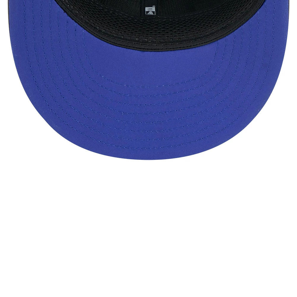 Buffalo Bills NFL Sideline 2026 Charcoal New Era 9FIFTY Snapback Adjustable Cap, inside view showing the blue undervisor and black internal taping alongside the mesh sweatband, providing a detailed look at the cap's interior craftsmanship.