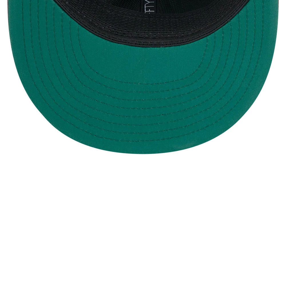 New York Jets NFL Sideline 2026 Charcoal New Era 9FIFTY Snapback Adjustable Cap, inside view showing a green undervisor, black sweatband with stitching, and New Era branding on the black taping along the interior of the cap.