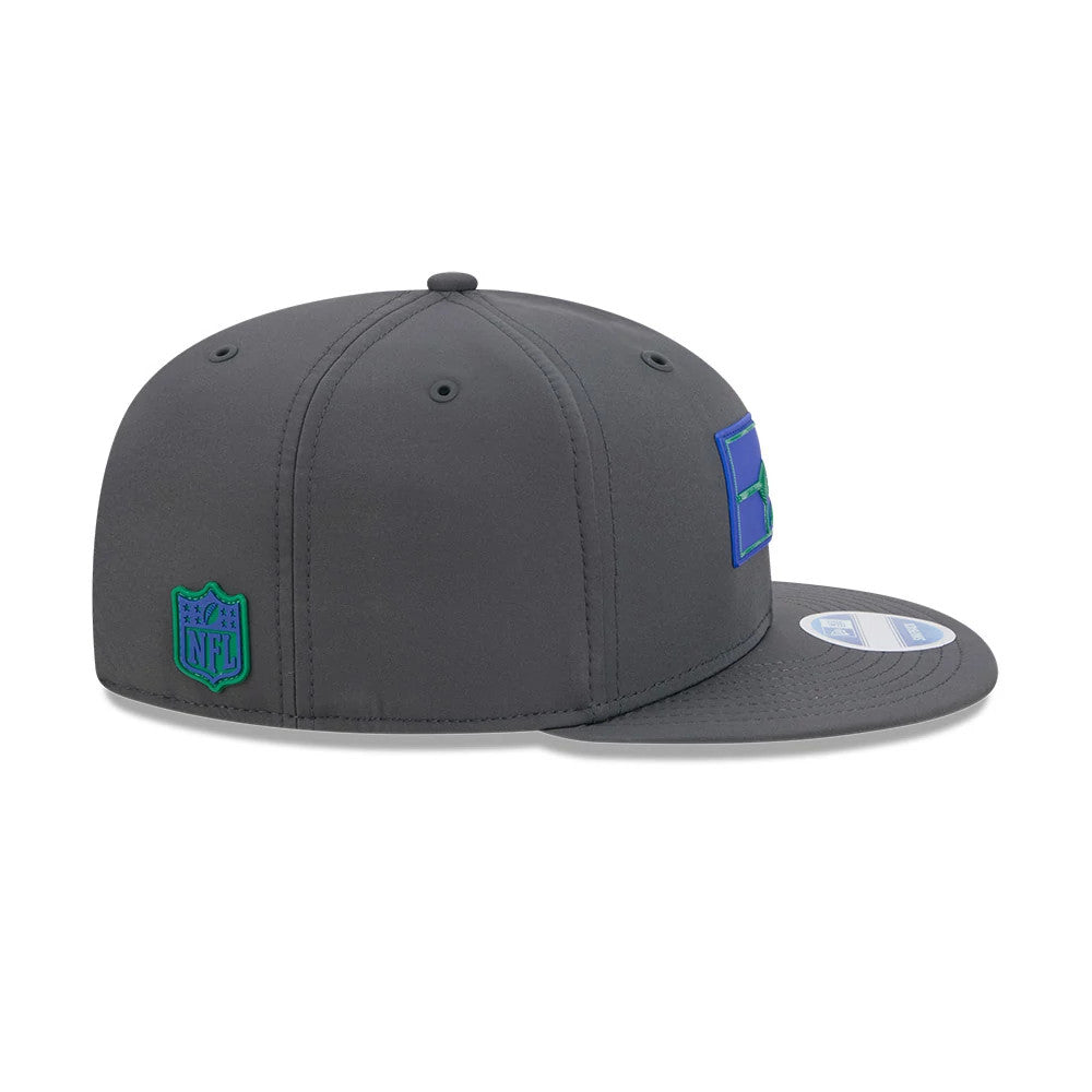 Pictured is this NFL Sideline 2026 Seattle Seahawks 9FIFTY Snapback cap in charcoal. 7