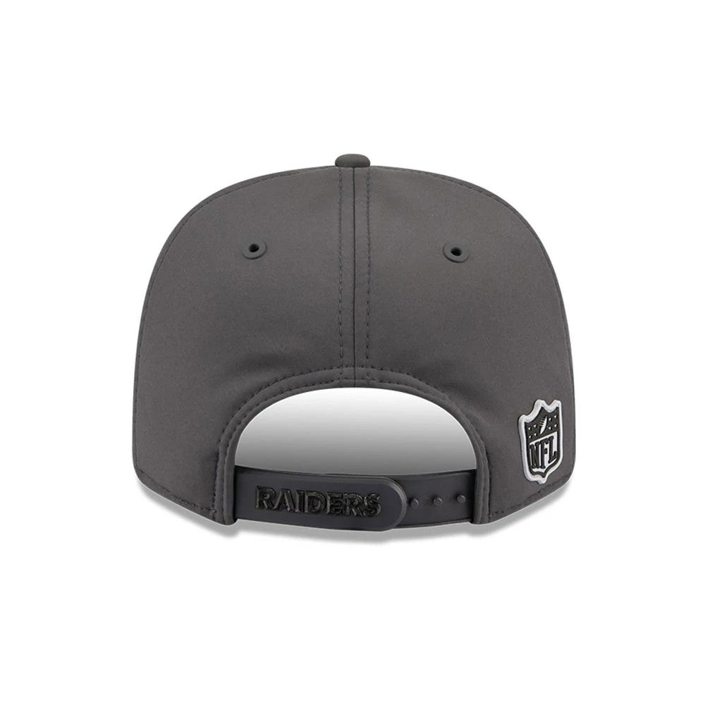 Raiders NFL Sideline 2026 Charcoal New Era 9SEVENTY Stretch Snap Adjustable Cap, rear view showing a black NFL logo patch on the right side, embroidered Raiders lettering across the snap closure.