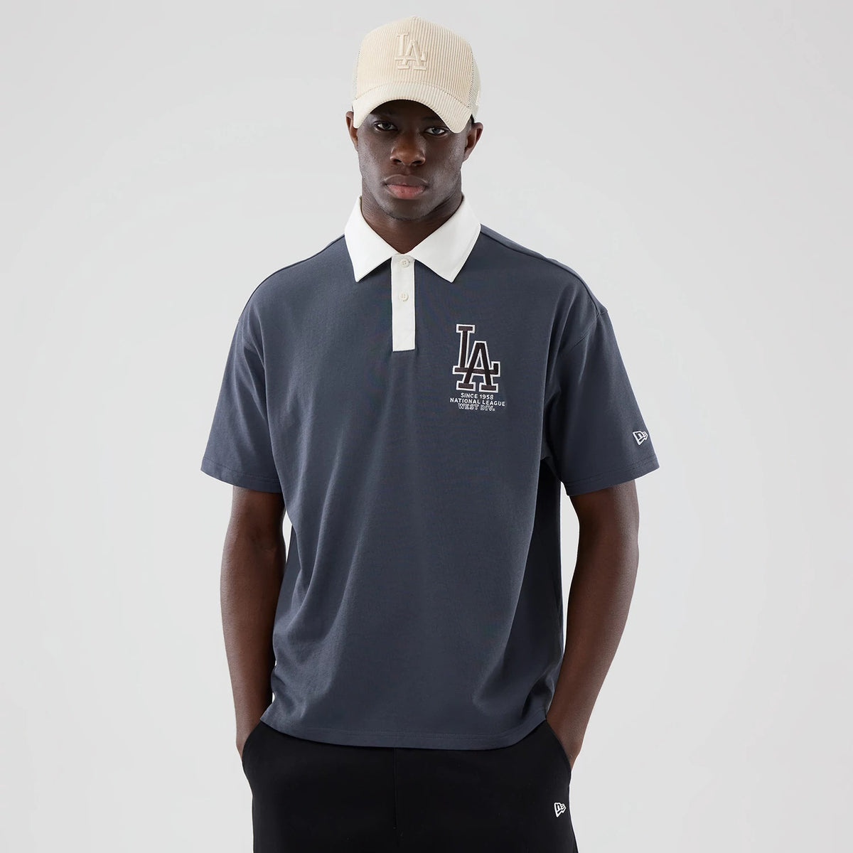 The model is wearing this MLB LA Dodgers Polo T-Shirt in grey. 3