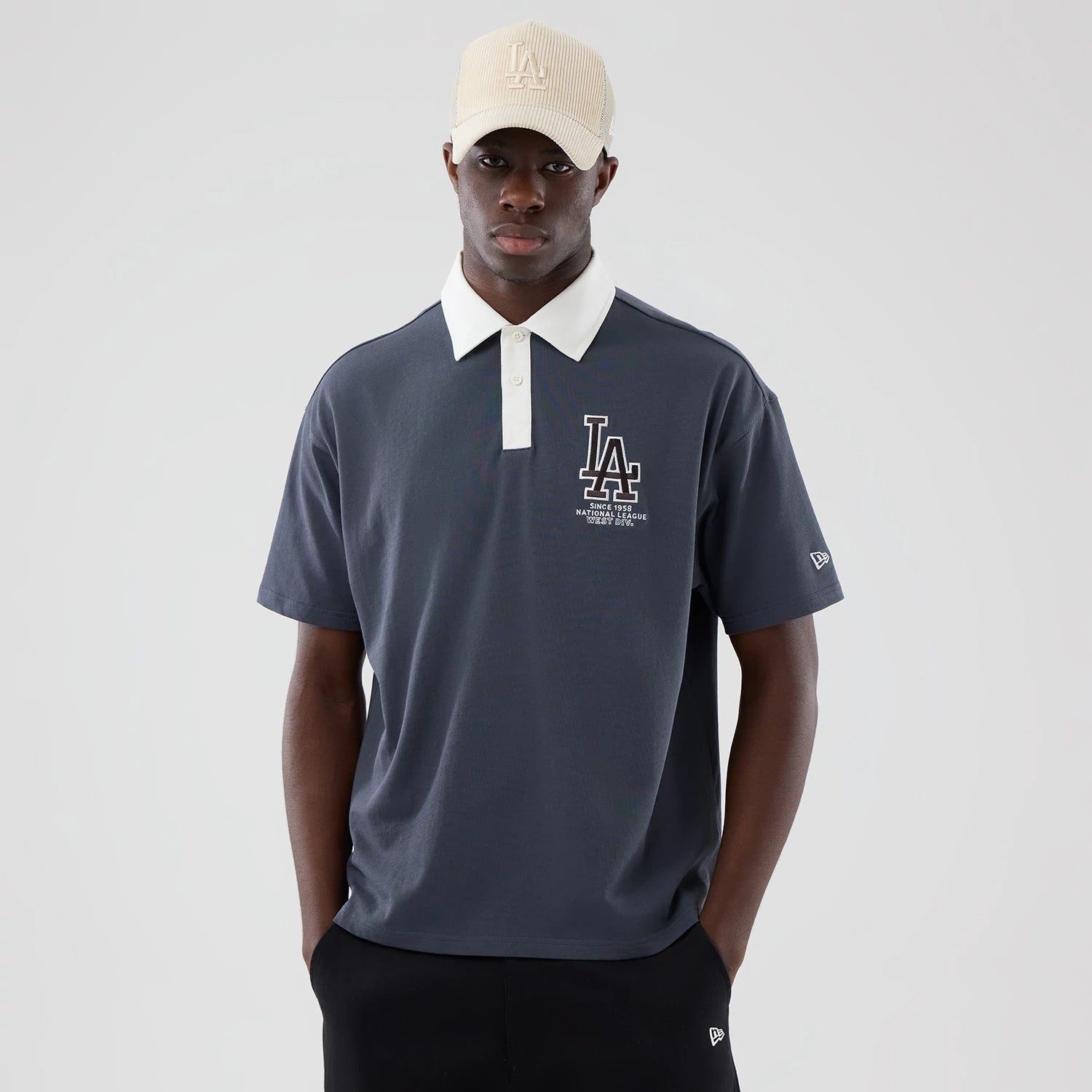 The model is wearing this MLB LA Dodgers Polo T-Shirt in grey. 3