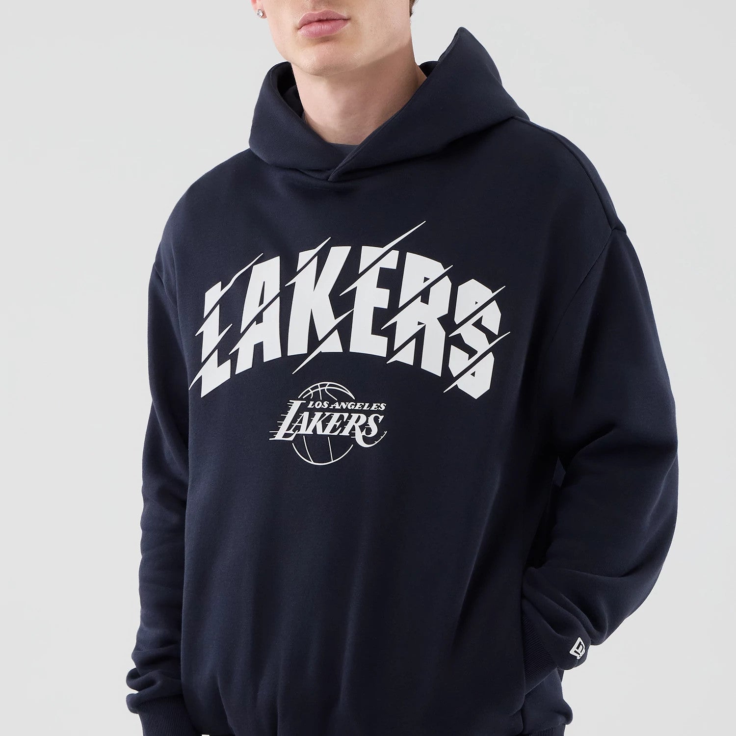 The model is wearing this NBA Core Plus LA Lakers Pullover Hoodie in navy. 3