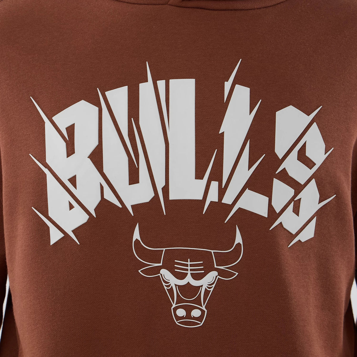 New Era Chicago Bulls NBA Core Plus Brown Pullover Hoodie, front view showing a large white printed Bulls graphic in a stylised font across the chest with the classic Chicago Bulls logo prominently displayed beneath the text.