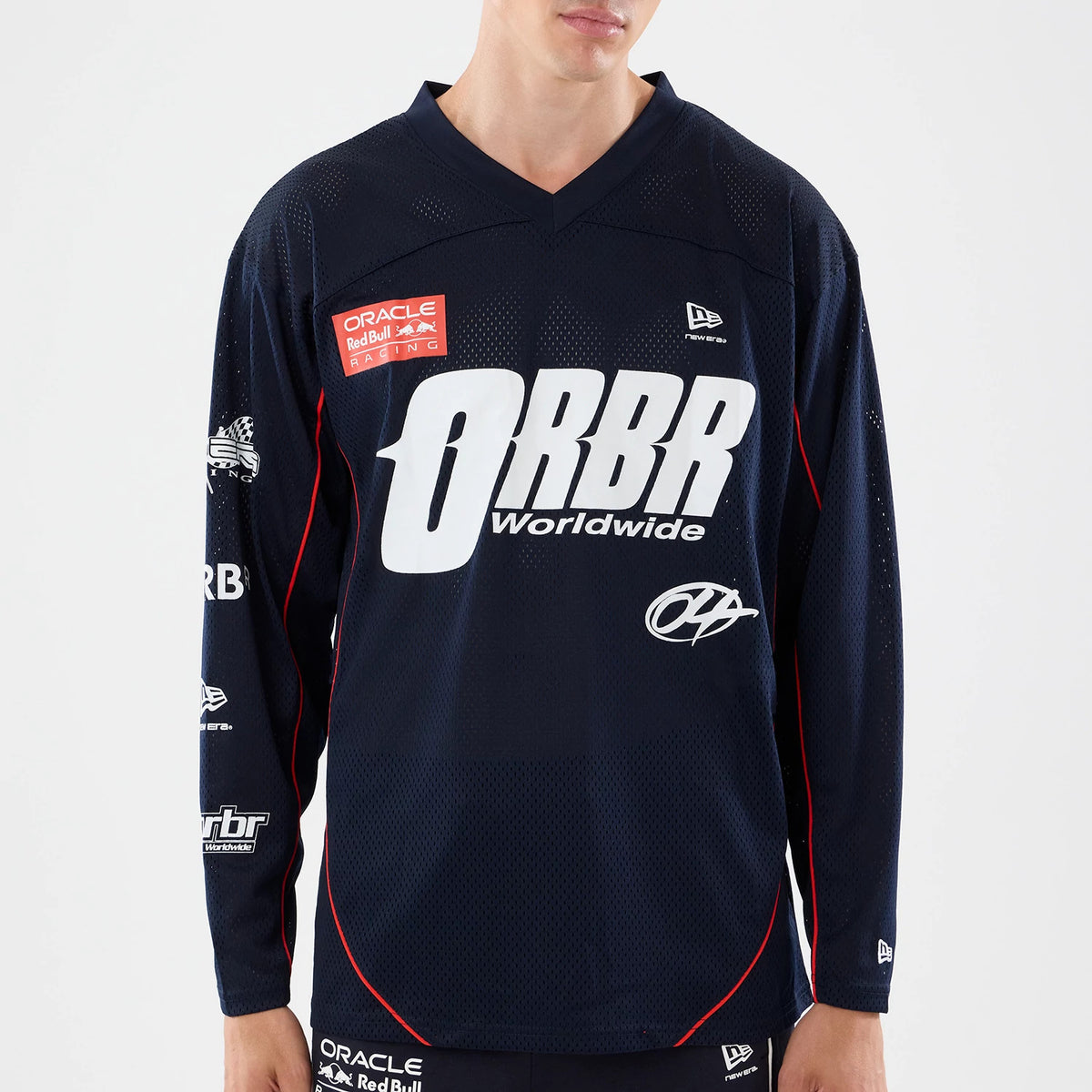 The model is wearing this Red Bull Racing Hockey Jersey in dark blue. 4