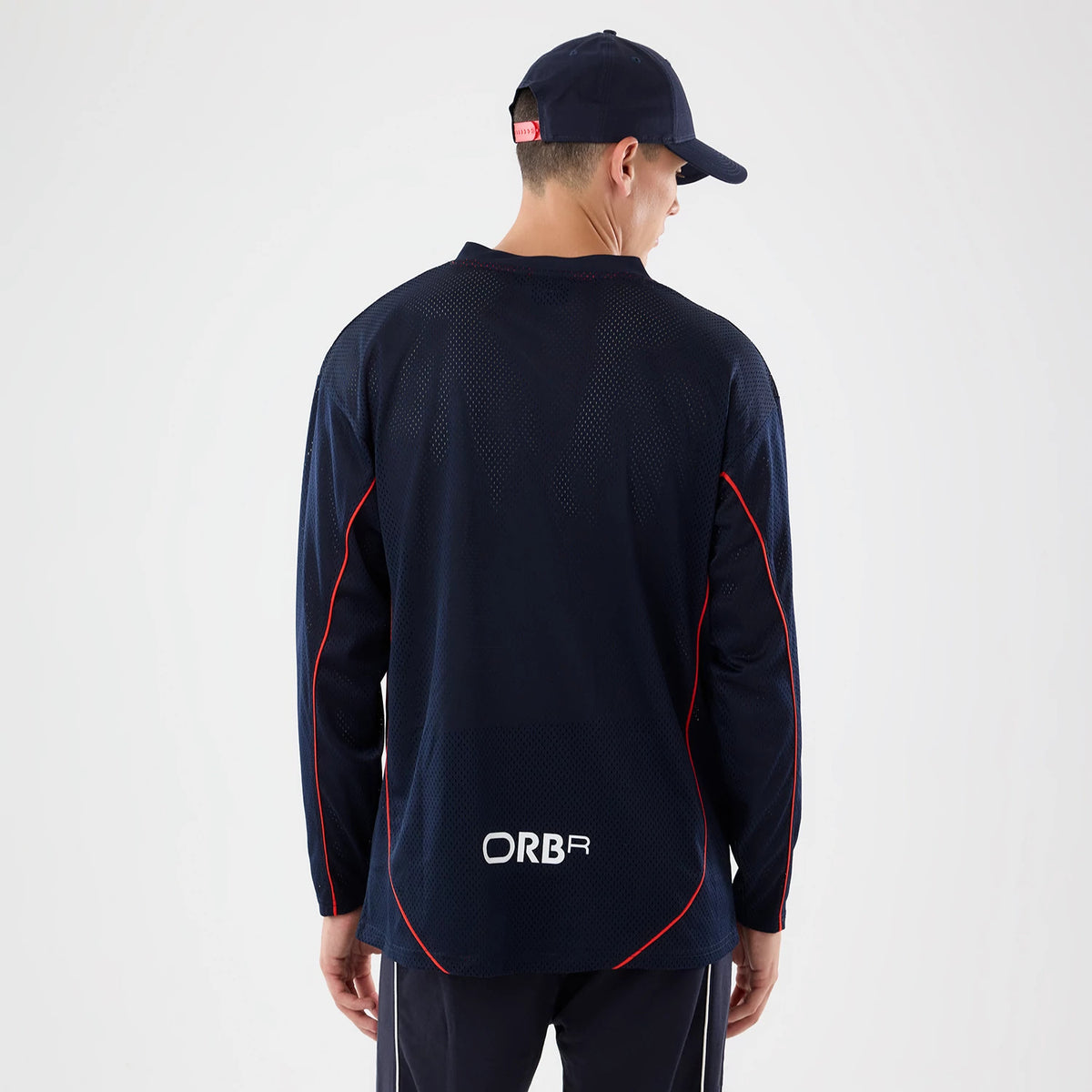 The model is wearing this Red Bull Racing Hockey Jersey in dark blue. 2