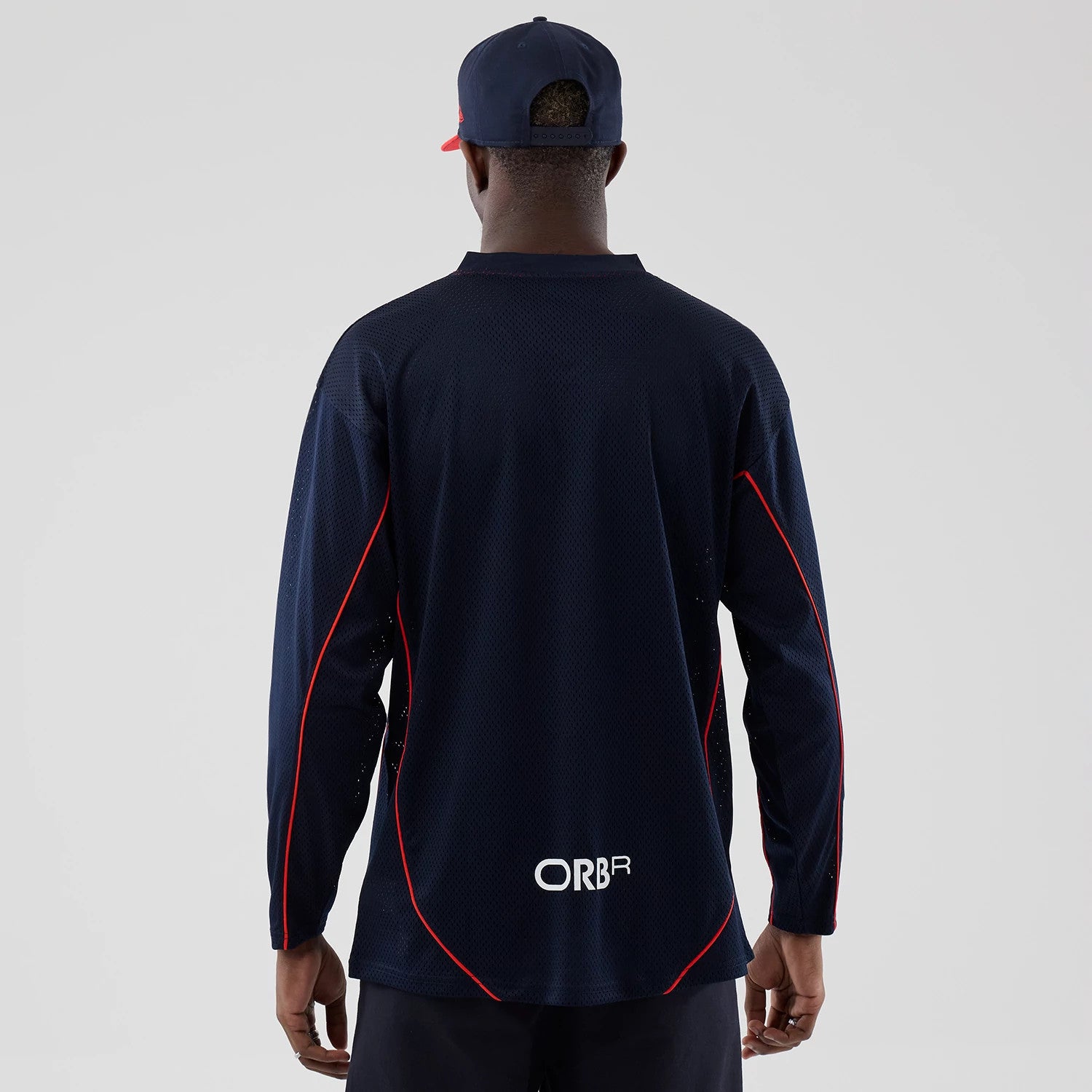 The model is wearing this Red Bull Racing Hockey Jersey in dark blue. 2
