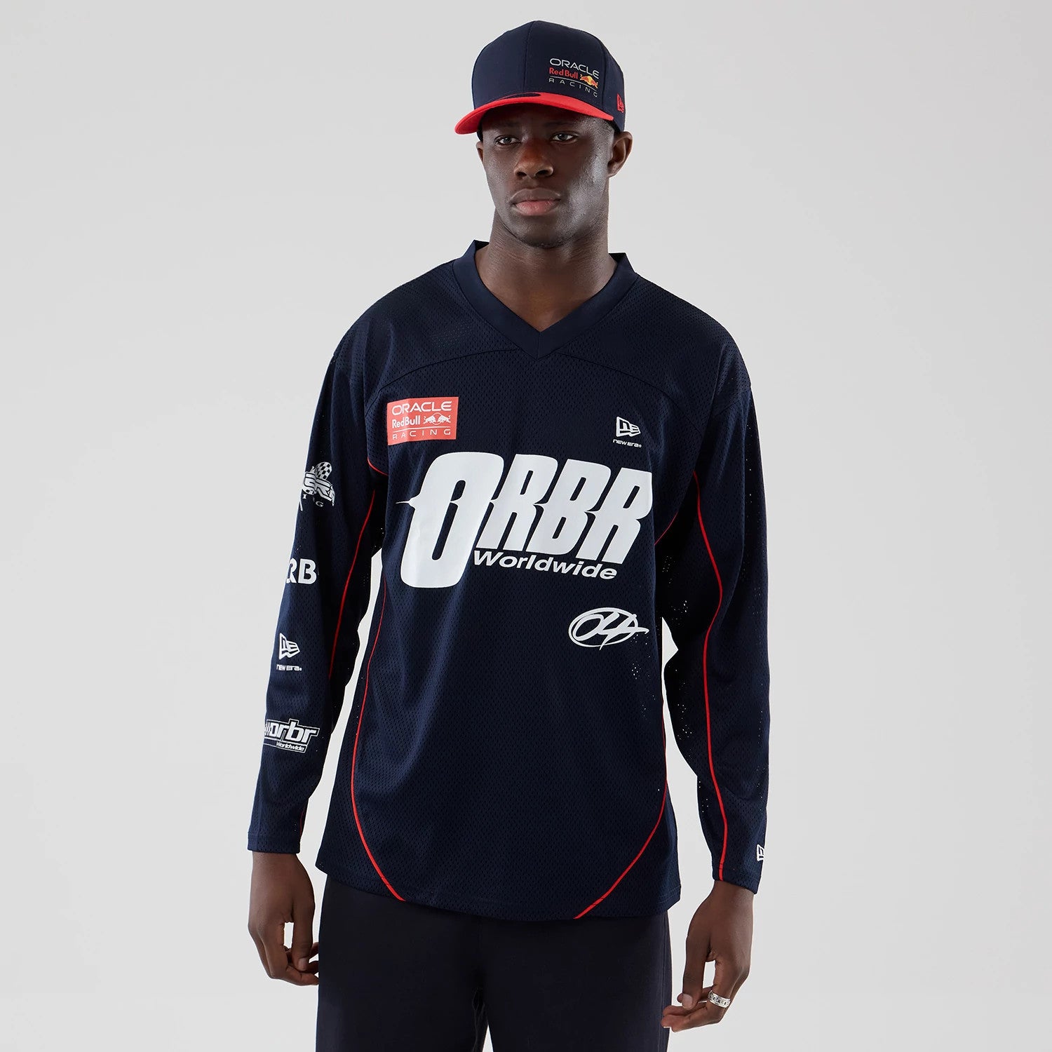 The model is wearing this Red Bull Racing Hockey Jersey in dark blue. 1
