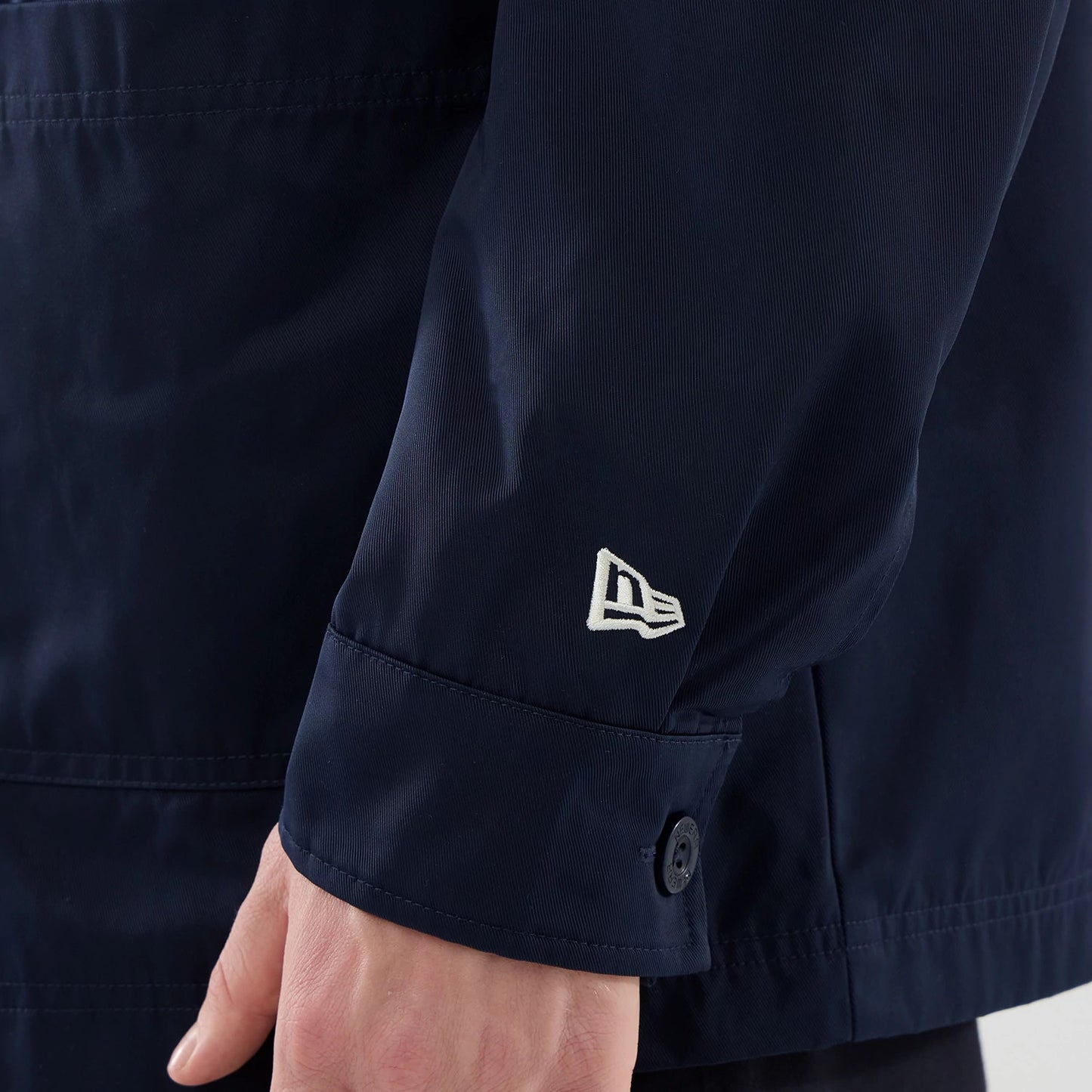 The model is wearing this New Era Shacket in navy. 7