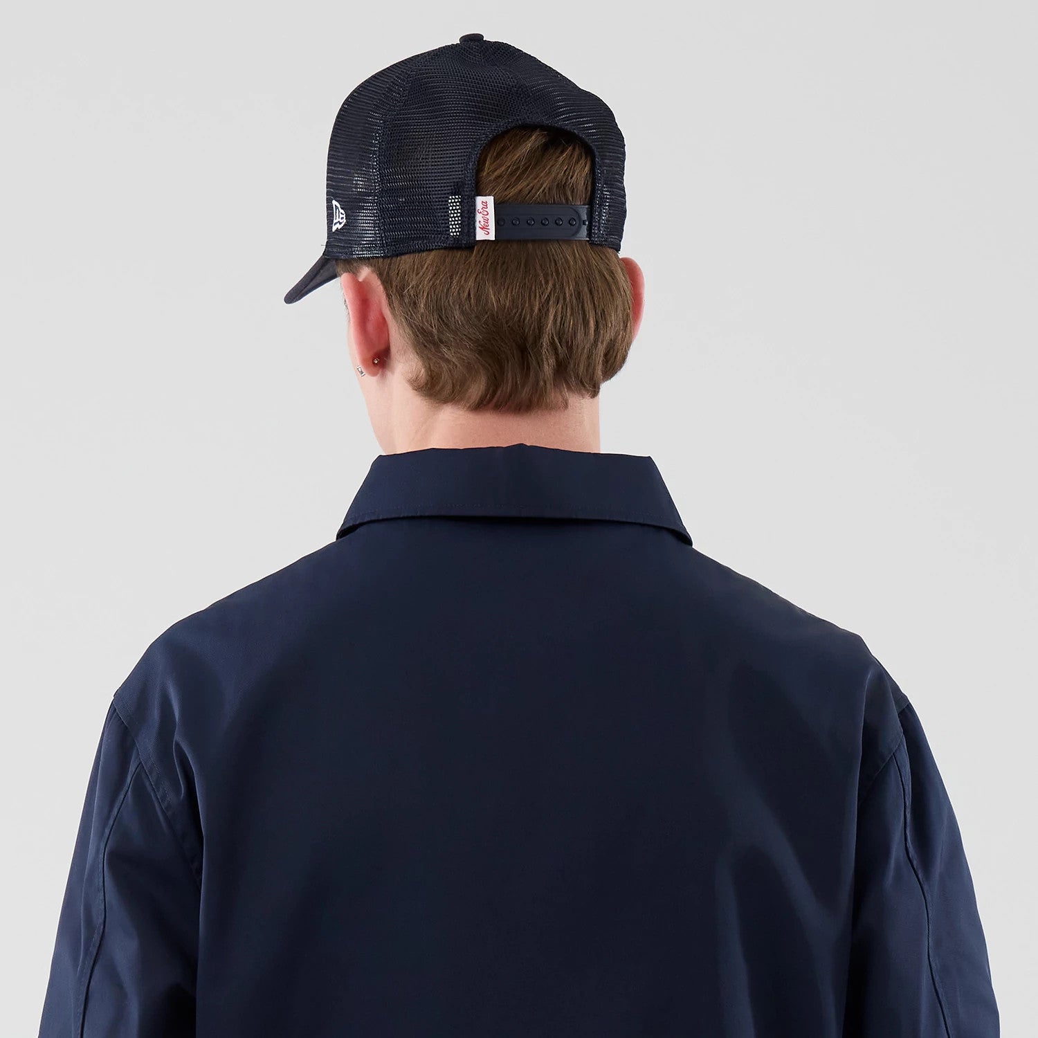The model is wearing this New Era Shacket in navy. 4