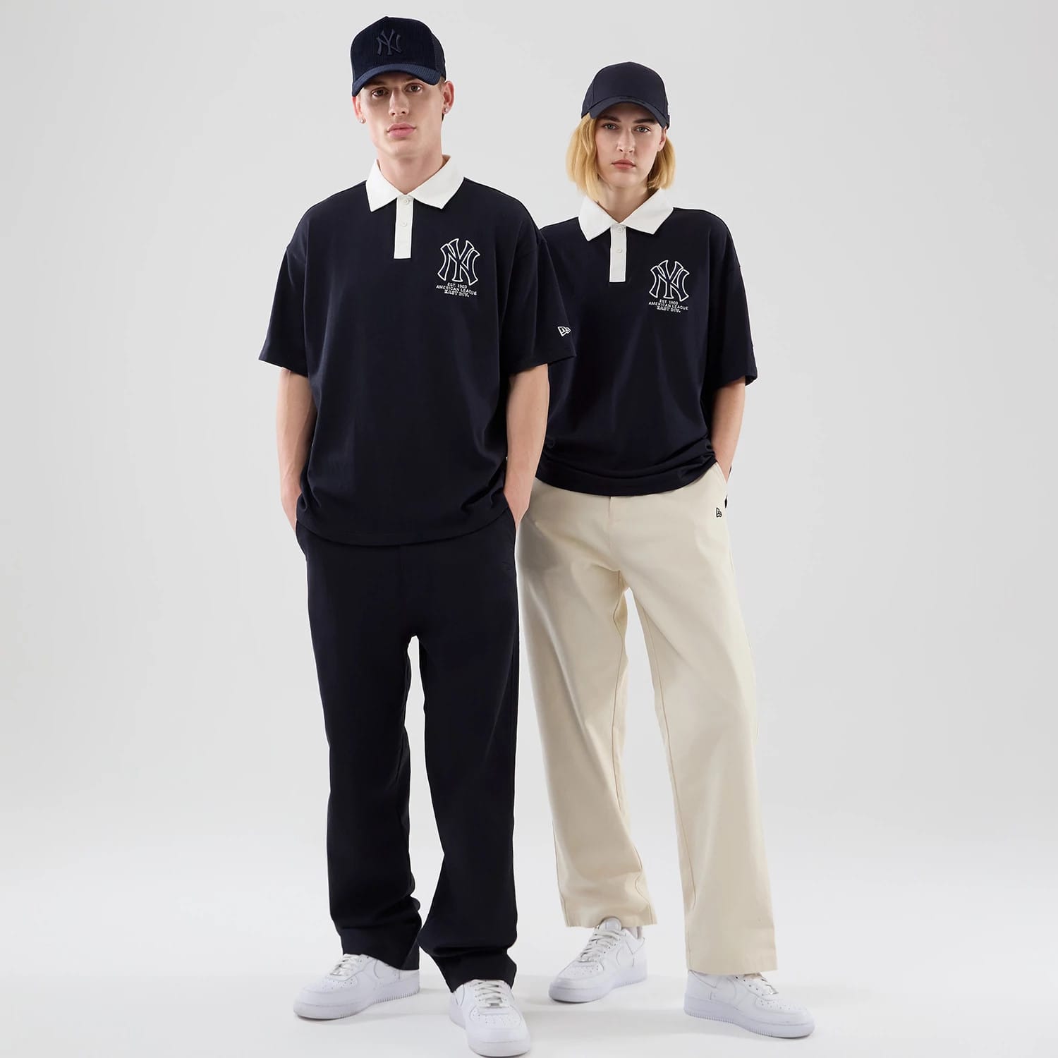 The model is wearing this MLB New York Yankees Polo T-Shirt in navy. 1