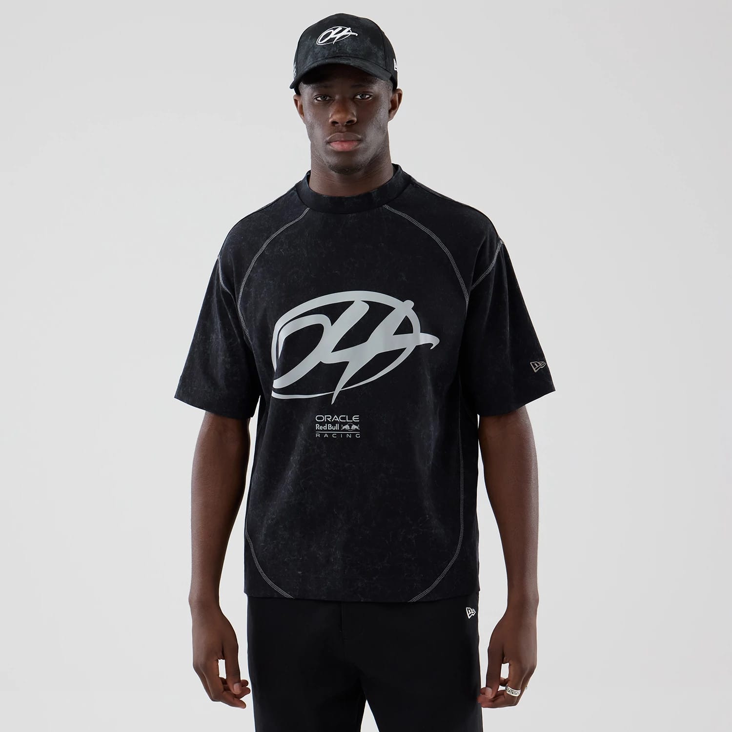 The model is wearing this Red Bull Racing Drop Shoulder T-Shirt in black. 1