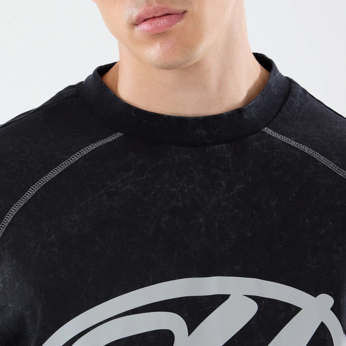 The model is wearing this Red Bull Racing Drop Shoulder T-Shirt in black. 4